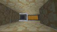 The first hopper minecart and the double chest (Image via Mojang)